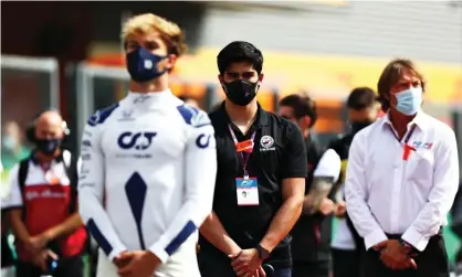  ??  ?? Juan Manuel Correa (centre) takes part in a minute of silence for the late Anthoine Hubert before the Belgium Grand Prix in August 2020. Photograph: Dan Istitene/Formula 1/Getty Images