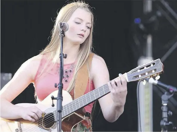  ??  ?? Edmonton singer-songwriter Rebecca Lappa wrote the song Valiant of Vimy Ridge, about a Calgary-born soldier who was awarded the Victoria Cross. The effort has earned her a trip to Vimy to commemorat­e the centennial of the First World War battle.