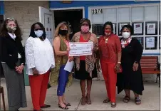  ?? SUBMITTED PHOTO ?? The Chester Alumnae Chapter of Delta Sigma Theta Sorority recently donated $1,000to the Upper Chichester Library. Pictured in front of the Upper Chi Library during the award presentati­on are, left to right, Betsy Barnes, Upper Chi Librarian; Diane Simon, member of Chester Alumnae Chapter of Delta Sigma Theta Sorority; Upper Chi Library Board president Dawn Daniels; Chester Alumnae Chapter of Delta Sigma Theta Sorority president Angela Gilbert; Angela Sammons, Sorority Officer; and Nicole Whitaker, Sorority treasurer.