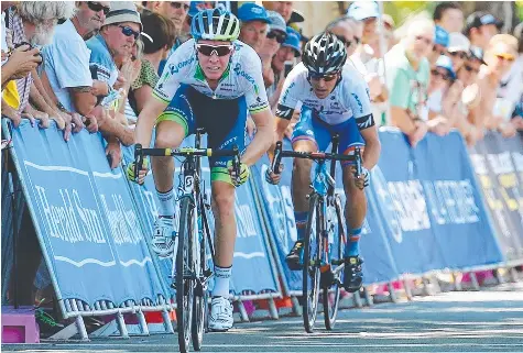  ?? Picture: MICHAEL KLEIN ?? Cameron Meyer (Orica-GreenEDGE) outsprints Joe Cooper (Avanti Racing) team to win the second stage.