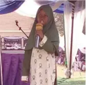  ??  ?? Little Miss Aliyah Salami, a pupil of Afemai Coeducatio­nal College, Auchi reciting poem of Allahu Akbar at the Auchi Day celebratio­n