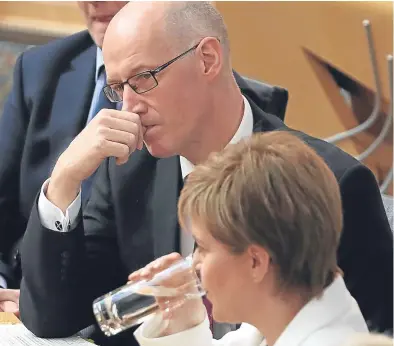  ?? Picture: PA. ?? Education secretary John Swinney and First Minister Nicola Sturgeon at FMQs.