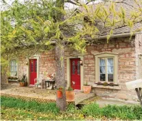  ??  ?? Built in Ste-Geneviève by a stone mason in the 1830s, the house’s red mortared stone walls are two feet thick.