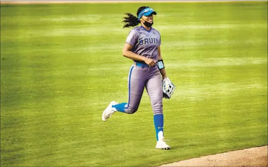  ?? Photograph­s by Gina Ferazzi Los Angeles Times ?? UCLA’s Maya Brady is one of the top hitters for the second-ranked Bruins. The Oaks Christian High graduate has nine home runs with 25 RBIs and a .309 average.