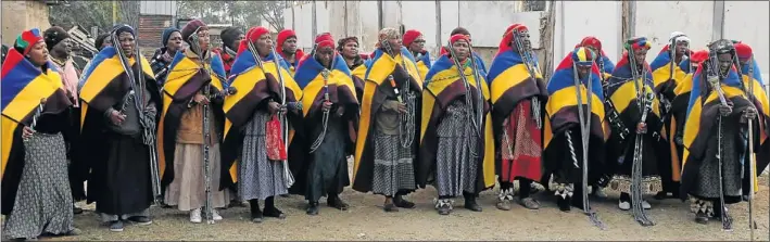  ?? PHOTOS: PEGGY NKOMO ?? WAIT ’ S OVER: Proud parents in Ndebele gear sing songs of praise as their sons return home after spending two months in the mountain undergoing a rite of passage to manhood through circumcisi­on