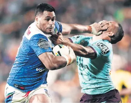  ?? Getty Images ?? Warriors forward Sam Lisone fends off Benji Marshall last night at Mt Smart.