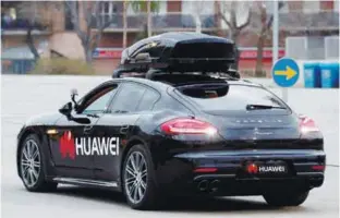  ??  ?? ... A driverless car controlled by a Huawei Mate 10 Pro mobile is pictured during the Mobile World Congress in Barcelona, Spain yesterday.