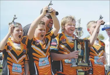  ??  ?? Nyngan Tigers Harry Gudgeon, Darcy Yeomans, Jack Finlay - Coach Ron Finlay