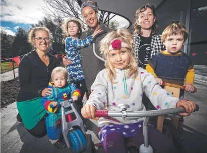  ??  ?? Playgroup participan­t Nena Aleschewsk­i, with Willow, 1, and Rosie, 4, Nadia Booker with Sienna, 5, and Holly Jones and Cohen, 2, at the South Hobart Community Centre.