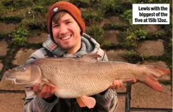  ??  ?? Lewis with the biggest of the five at 15lb 12oz.