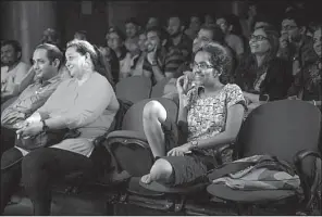  ?? For The Washington Post/KAREN DIAS ?? A rapt audience watches a comic’s routine at the Canvas Laugh Club in Mumbai. American-style stand-up is emerging as the cool new thing among young people in India’s big cities.