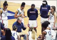  ?? David Butler II / Associated Press ?? UConn coach Geno Auriemma talks to his team during a timeout in the first half against DePaul on Tuesday.