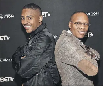  ?? PARAS GRIFFIN / GETTY IMAGES FOR BET ?? Actor Keith Powers (left), who plays Ronnie DeVoe in BET’s miniseries “The New Edition Story,” poses with DeVoe himself at BET’s Atlanta screening on Jan. 5 at AMC Parkway Pointe in Atlanta.