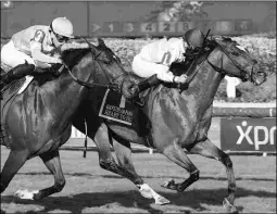  ?? BARBARA D. LIVINGSTON ?? Heart to Heart beats Kurilov in the Gulfstream Park Turf on Saturday for the first Grade 1 victory of his career.