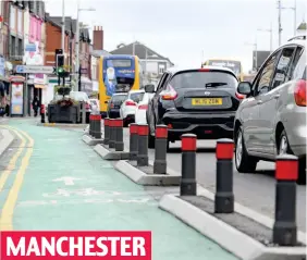  ??  ?? MANCHESTER Not a cyclist to be seen as cars on Wilmslow Road slow to a crawl