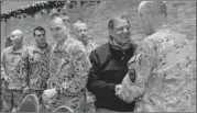  ??  ?? Defense Secretary Leon Panetta meets with commanders, including Marine Gen. John Allen (third from right).