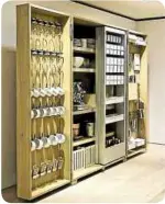  ??  ?? Have an extra wall? A standalone storage like this one by Bulthaup folds in to look like a cabinet when closed.