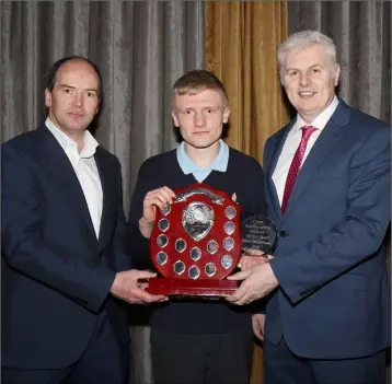  ??  ?? Student of the Year Robert McGuinness with principal John Ryan and special guest Adrian Fenlon.