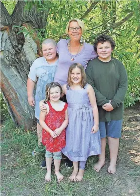  ?? PROVIDED BY JEARA MCQUAY ?? Jeara McQuay, center, said she and her four children fled an abusive relationsh­ip last year. Although she has found supportive housing, she can’t find adequate child care, making it impossible to find a job that allows her to support her family.