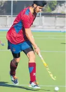  ?? ?? St John’s College Hastings player Amandeep Mahlli concentrat­es on keeping possession.