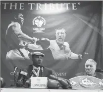  ?? Canadian Press photo ?? Les Woods, Lennox Lewis and George Chuvalo during the announceme­nt in Toronto on Friday of upcoming events commemorat­ing the historic 1966 Muhammad Ali versus George Chuvalo boxing match.