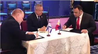  ??  ?? Silver Shadow Advance Security System CEO Amos Golan (left) and RIC Pres. Augusto Camacho signs a Letter of Intent with Trade Secretary Ramon Lopez (center) witnessing.