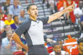  ?? Chase Stevens Las Vegas Review-journal @csstevensp­hoto ?? Omar Bermudez of Mexico, an aspiring NBA official, works Tuesday’s game between the Atlanta Hawks and the Indiana Pacers at the Thomas & Mack Center.