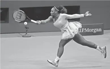  ??  ?? Serena Williams returns a shot to Anastasija Sevastova during Thursday’s semifinals of the U.S. Open tennis tournament in New York.