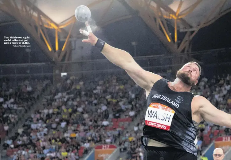  ?? Picture / Greg Bowker ?? Tom Walsh won a gold medal in the shot put with a throw of 21.41m.