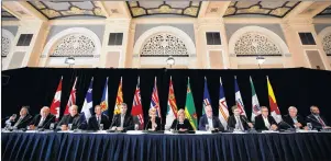  ?? CP PHOTO ?? Canada’s premiers give a final press conference during the Council of Federation meetings in Edmonton, Alta., on Wednesday.