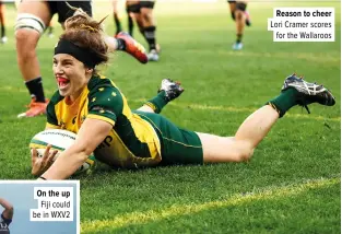  ??  ?? Reason to cheer Lori Cramer scores
for the Wallaroos