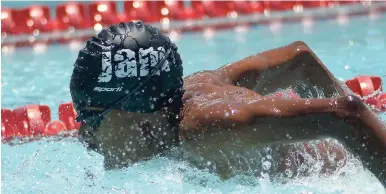  ?? IAN ALLEN/PHOTOGRAPH­ER ?? Nikolos Gordon-Somers in the Boys 11-12 50-metre butterfly during the Burger King/Popeye/YMCA Prep School Swim meet which was held at the National Stadium Pool on Friday.