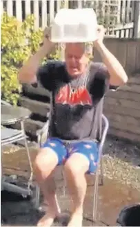  ??  ?? Cool down Minister of Cambuslang Baptist Church Brian Graham does the ice bucket challenge