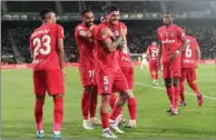  ?? (AFP) ?? Atletico Madrid’s Rodrigo De Paul (right) celebrates after scoring a goal during the Spanish league match against Elche CF at the Martinez Valero stadium in Elche on Wednesday.