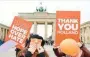  ?? — AFP ?? People celebrate the results of the Dutch elections, in front of the Brandenbur­g gate in Berlin, on Thursday.