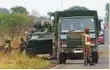  ?? Reuters ?? Military vehicles on a street outside Harare.