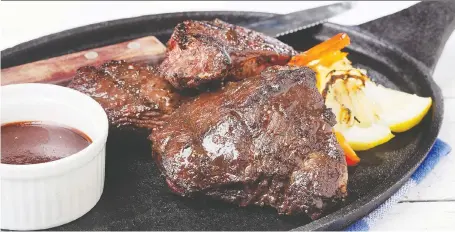 ?? PHOTOS: ATCO BLUE FLAME KITCHEN ?? This steak recipe takes some time, but the garlicky results will be appreciate­d by your family members.