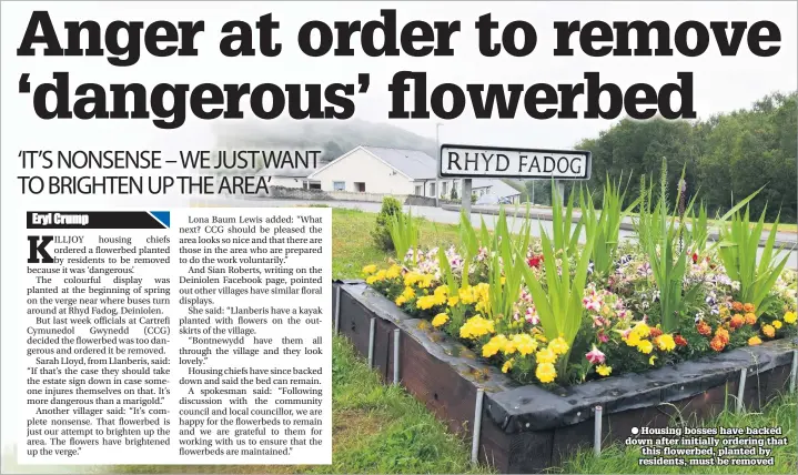  ??  ?? ● Housing bosses have backed down after initially ordering that this flowerbed, planted by residents, must be removed