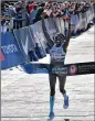  ??  ?? In the closest women’s Olympic Trials ever, Aliphine Tuliamuk (above) crossed the finish line first in 2:27.23. Molly Seidel finished eight seconds later.