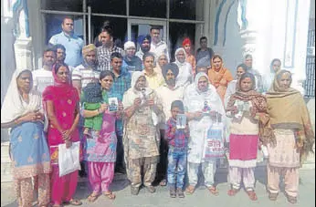  ?? SAMEER SEHGAL/HT ?? Family members of those killed in Iraq from the state at the gurdwara in Baba Bakala near Amritsar on Friday.