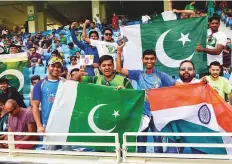  ?? Virendra Saklani/Gulf News ?? Supporters of the two countries enjoy the proceeding­s even as India and Pakistan battle it out in the Unimoni Asia Cup match.