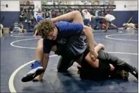  ?? Rachel Aston Las Vegas Review-journal @rookie__rae ?? Shadow Ridge junior Noah Gallardo, top, a second-place finisher last season, is in the hunt for the 182-pound state title at the Class 4A meet that begins Friday.