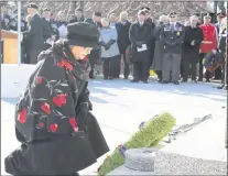  ?? JUANITA MERCER/THE TELEGRAM ?? Lt.-gov. Judy Foote greeted veterans, including decorated Second World War veteran Leo Knox, 94, at the National War Memorial after the Remembranc­e Day ceremony Sunday morning.