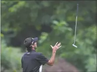  ?? Matt Sullivan / Getty Images ?? Bubba Watson tosses his club after missing a birdie putt on the 14th hole during the third round of the Travelers Championsh­ip at TPC River Highlands on Saturday in Cromwell.