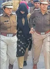  ?? SANT ARORA /HT ?? Honeypreet, the adopted daughter of the dera head, being taken to court in Panchkula Panchkula on Thursday.