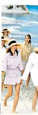  ??  ?? Transforma­tion: Chanel turned Paris’s Grand Palais into a beachy boardwalk down which came a stream of models, watched over by creative director Karl Lagerfeld on the jetty
