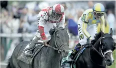  ?? PATRICK SEMANSKY/THE ASSOCIATED PRESS ?? Cloud Computing, ridden by Javier Castellano, gallops out after winning the Preakness Stakes horse race Saturday at Pimlico race course in Baltimore as Classic Empire, with Julien Leparoux aboard, finished for second.