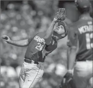  ?? NWA Democrat-Gazette/Jason Ivester ?? POP FLY: Arkansas third baseman Chad Spanberger grabs a fly ball as the Razorbacks complete a three-game sweep of Mississipp­i State Sunday in Fayettevil­le.