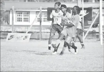  ?? ?? A moment in the Dolphin Secondary and Queen’s College fixture