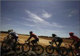  ?? CHRISTOPHE ENA - THE ASSOCIATED PRESS ?? The pack rides during the fourth stage of the Tour de France cycling race over 214 kilometers (133 miles) with start in Reims and finish in Nancy, France, Tuesday, July 9, 2019.